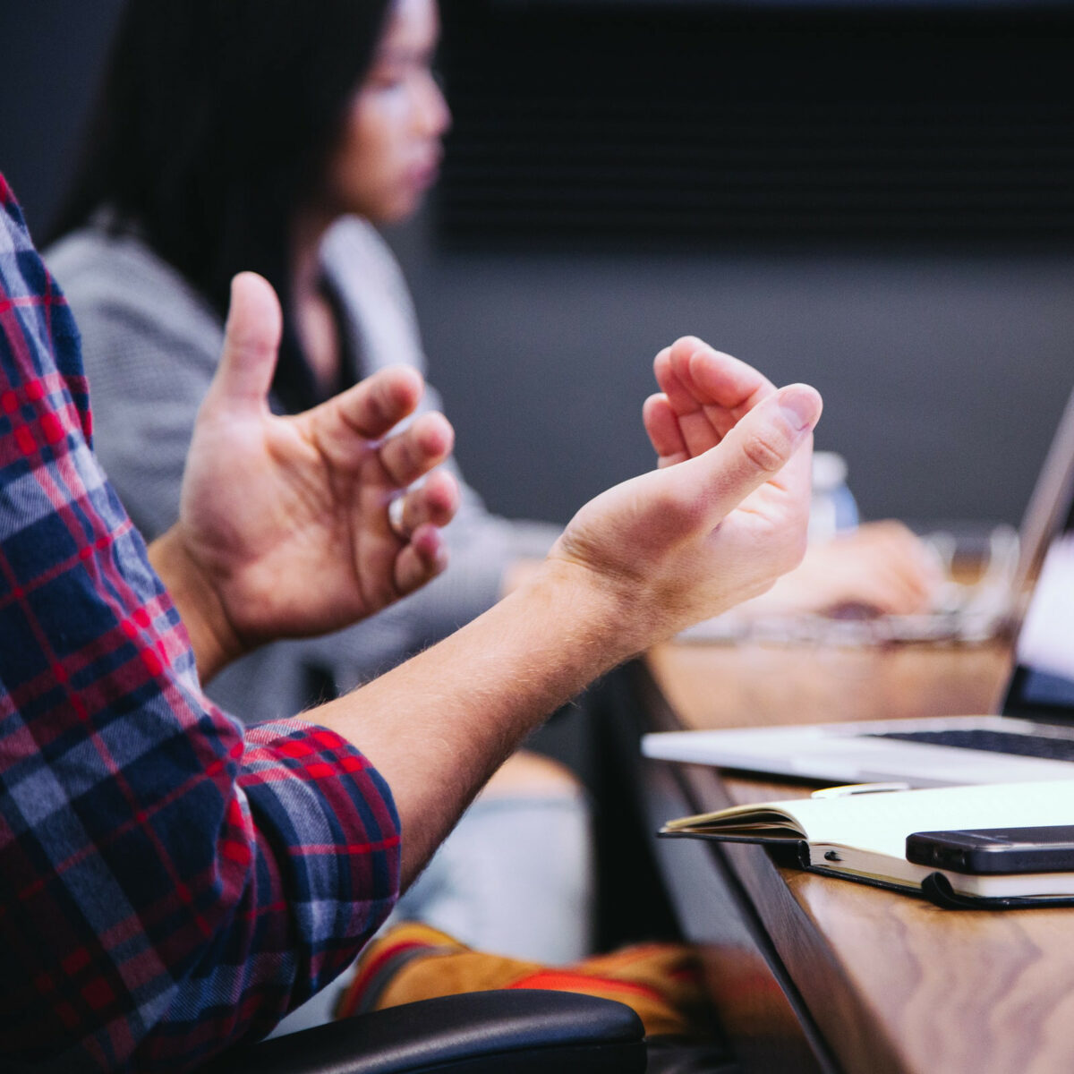 Close up of team members in a business meeting.