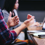 Close up of team members in a business meeting.