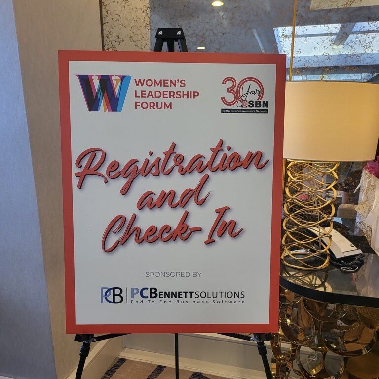 Women's Leadership Forum Welcome Sign with PC Bennett Solutions Branding