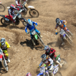 A group of dirt bikers going around a track. Acumatica Cloud ERP helps their companies race at the speed of business.
